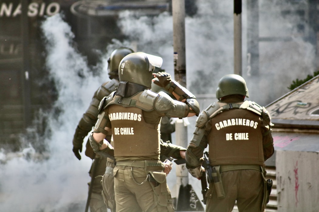 image of men with carabineros de chile on their uniforms